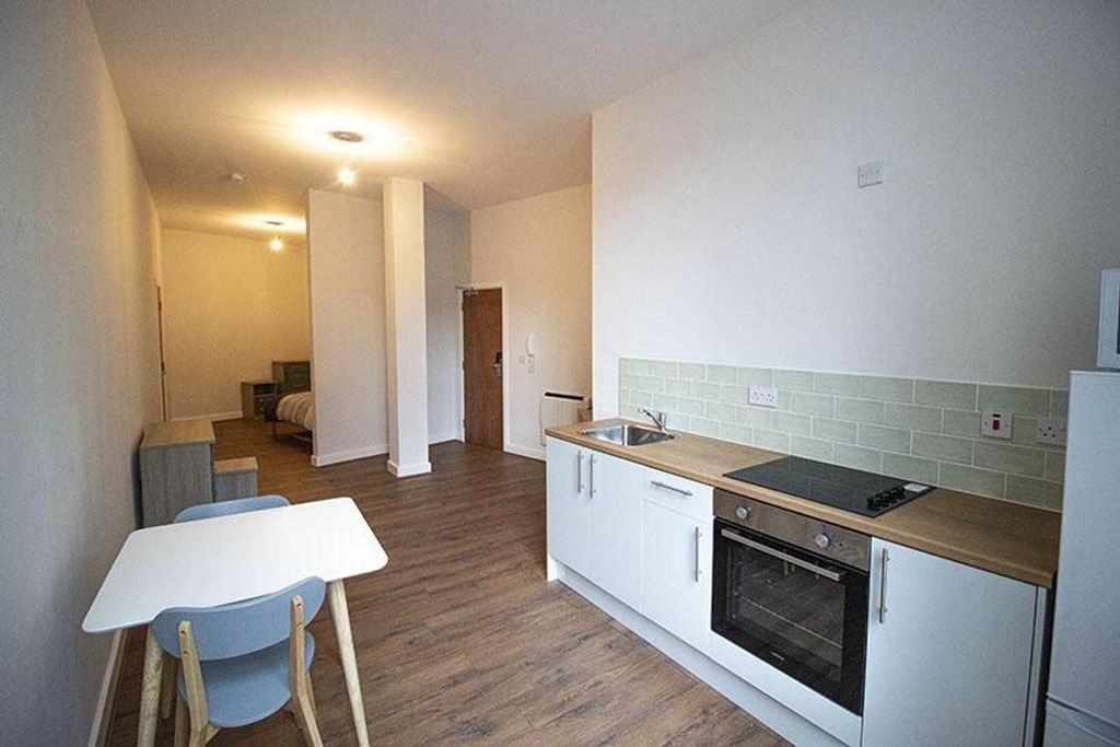Property photo 2 of 5 This Charming Kitchen Area Features Modern Applian...
