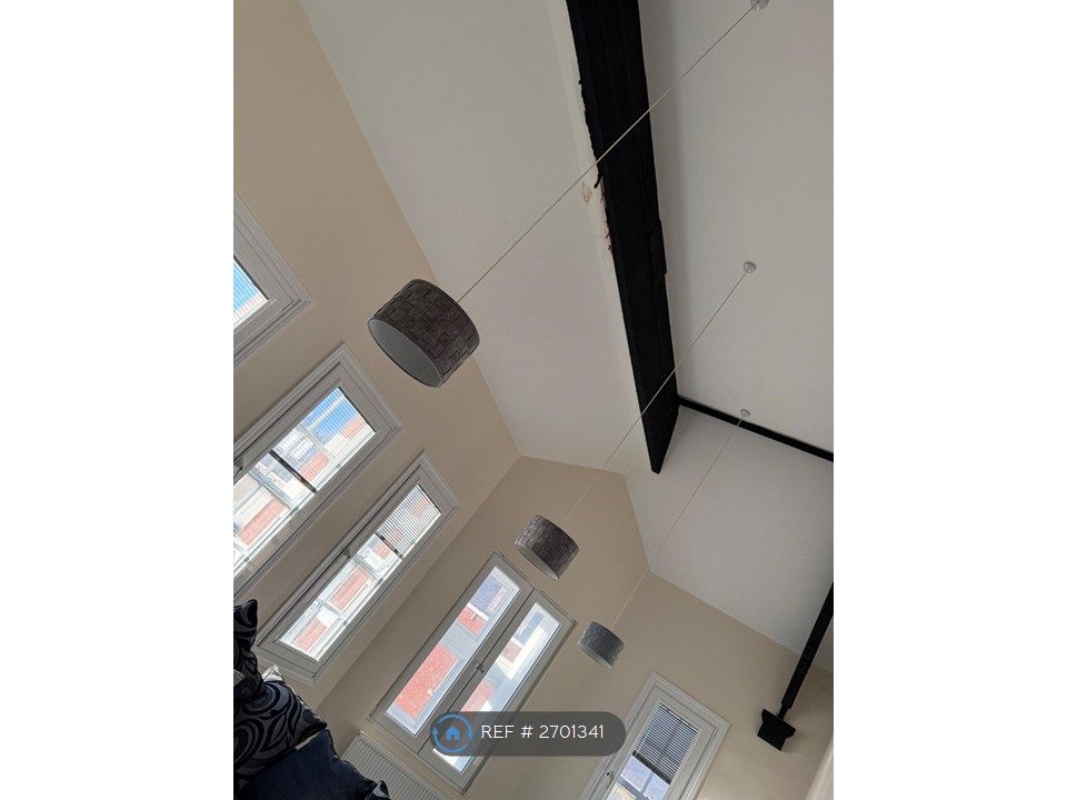 Property photo 2 of 12 Exposed Beams, Lounge, And Lighting