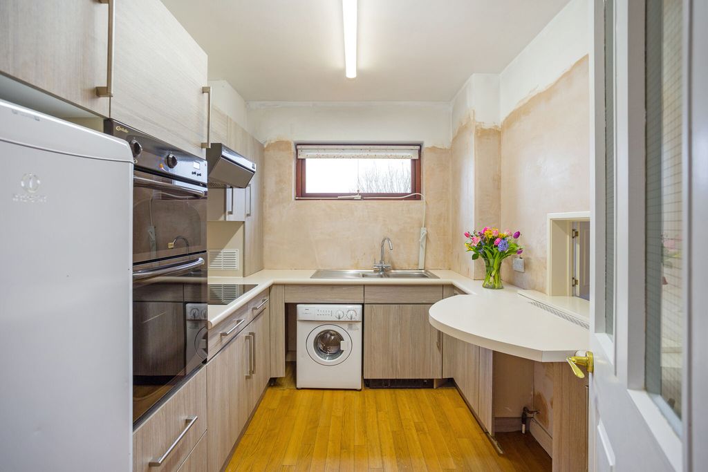 Property photo 2 of 12 Kitchen