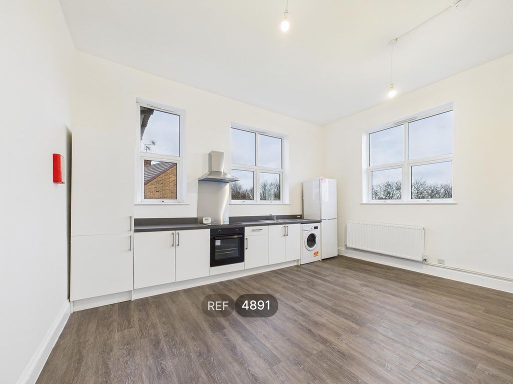 Property photo 3 of 12 Kitchen / Living Area