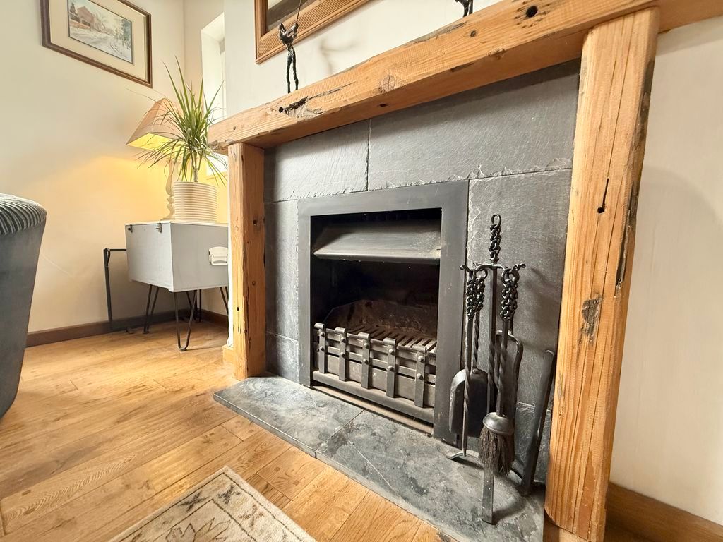 Property photo 3 of 17 Open Fireplace