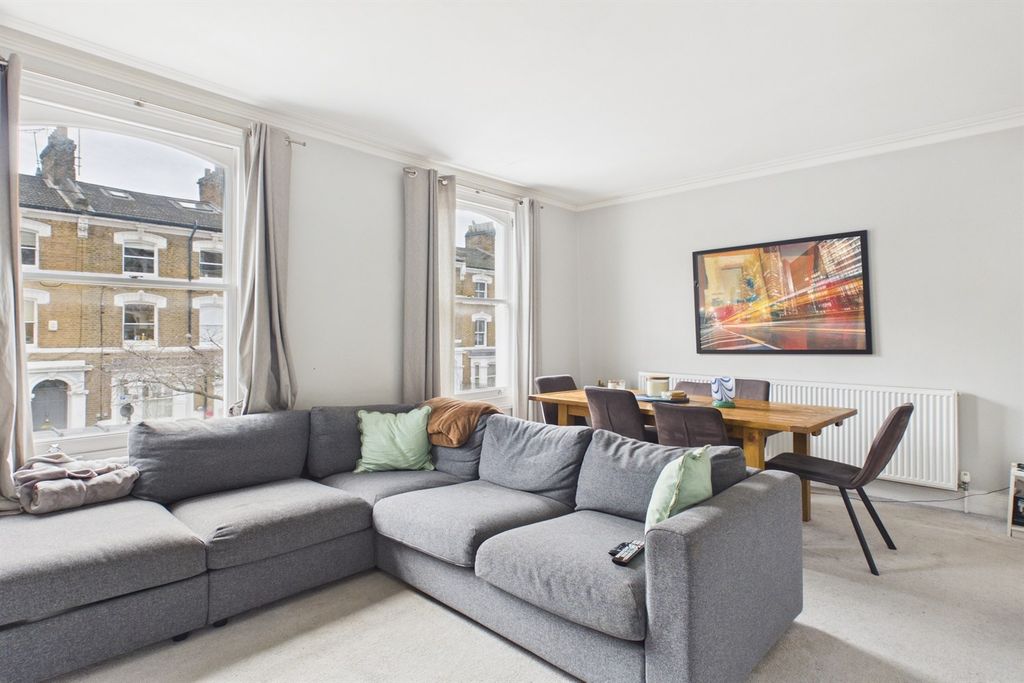 Property photo 3 of 12 Living Area