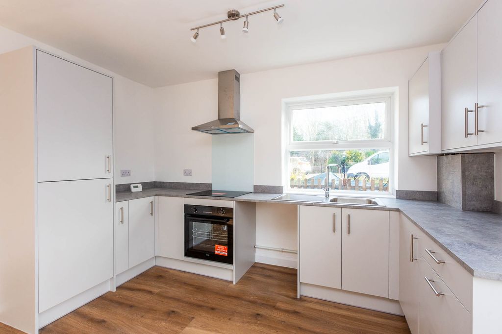 Property photo 2 of 12 Kitchen Area