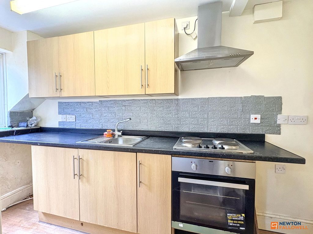 Property photo 3 of 16 Kitchen