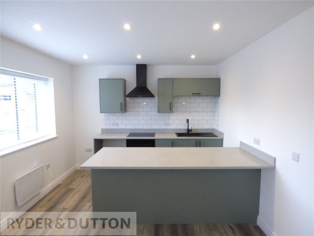 Property photo 3 of 11 Kitchen