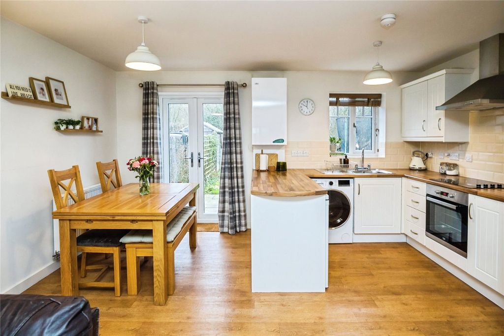 Property photo 3 of 14 Dining Kitchen