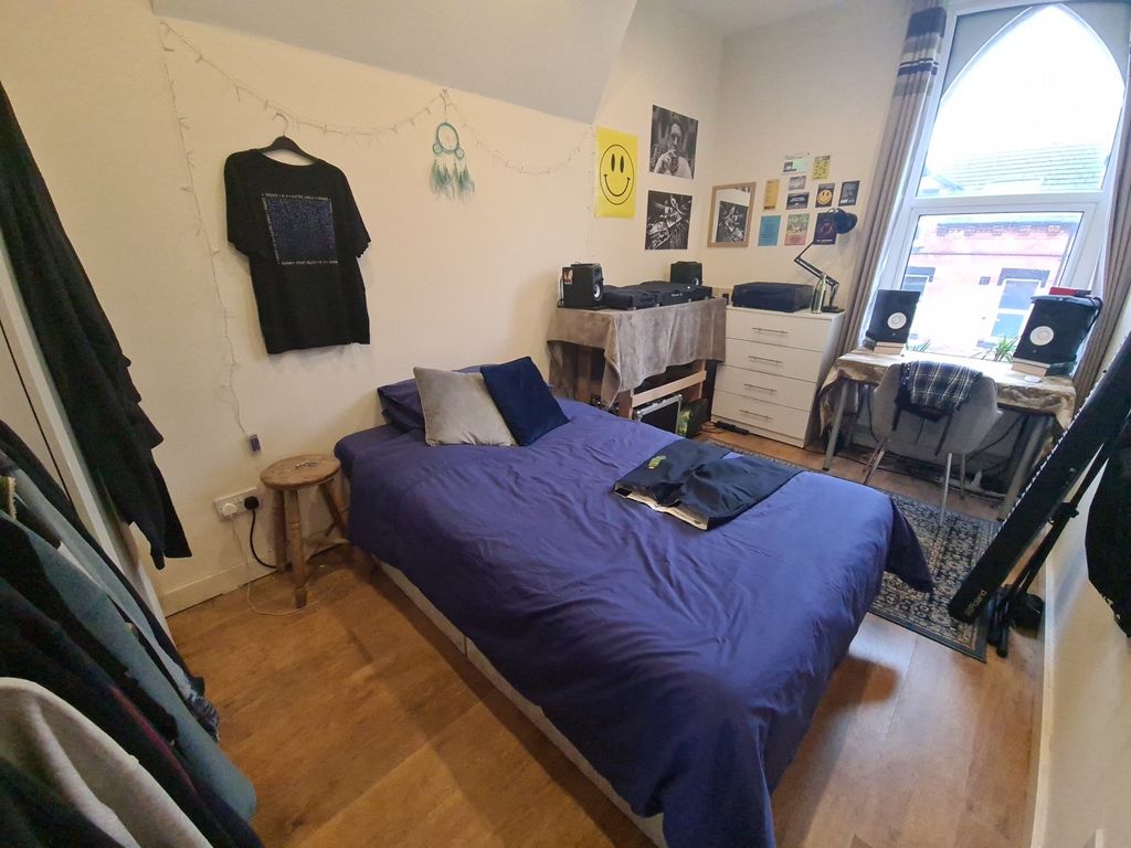 Property photo 2 of 29 Bright And Inviting Master Bedroom Featuring A Dou...