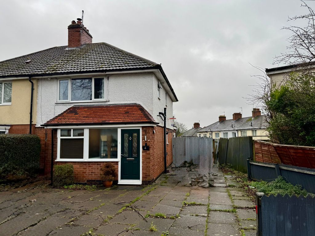Property photo 1 of 12 Front And Driveway