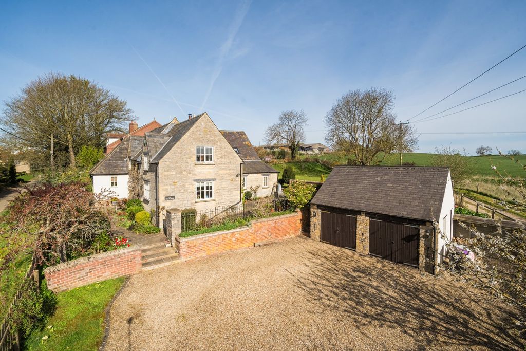 Property photo 2 of 22 Garage &amp; Driveway