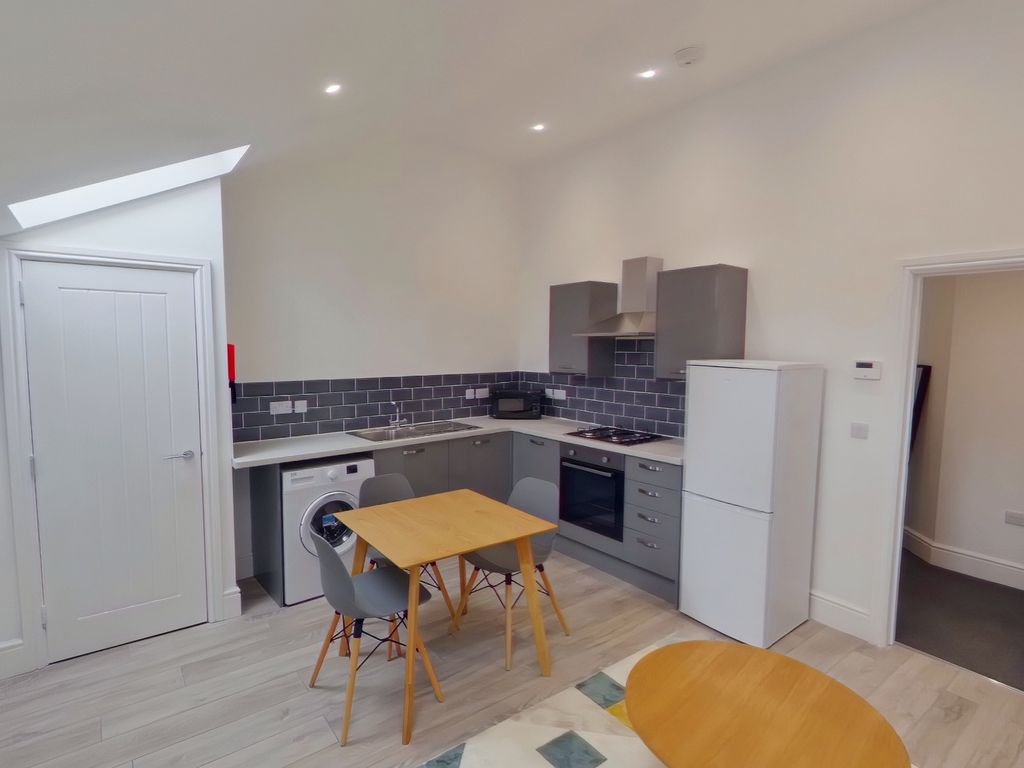 Property photo 2 of 5 A Modern And Inviting Kitchenette With Ample Natur...