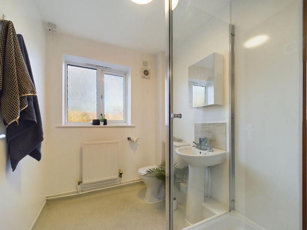 Property photo 2 of 9 A Clean And Bright Bathroom Featuring Modern Fixtu...