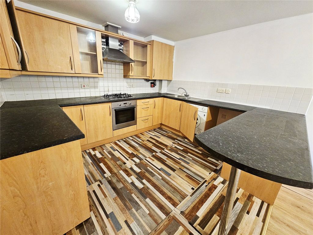 Property photo 3 of 9 Kitchen