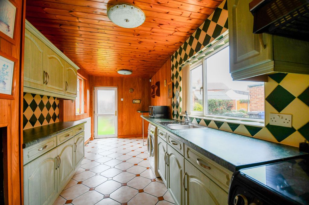 Property photo 3 of 13 Kitchen