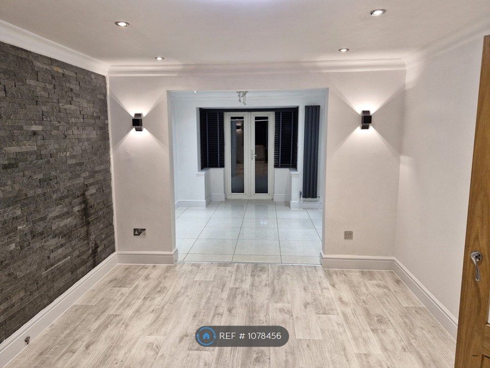 Property photo 3 of 28 Main Living Room Leading Into Dining Area