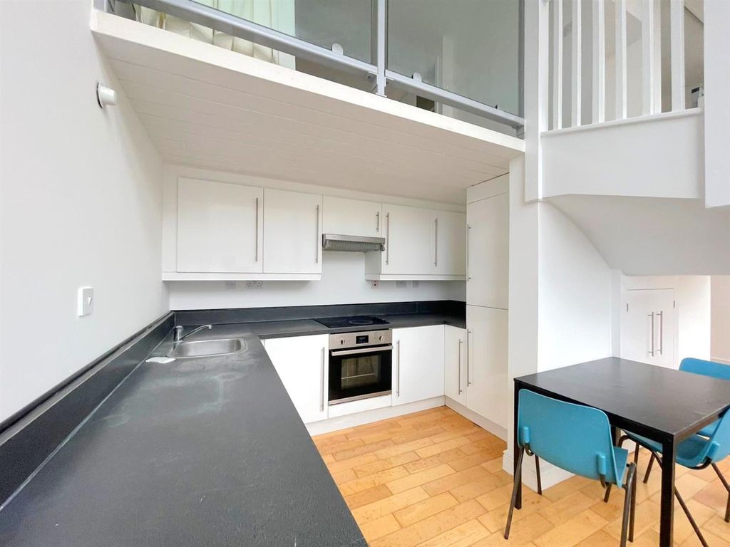 Property photo 2 of 11 Kitchen Area