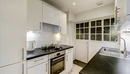 Property photo 3 of 7 Kitchen