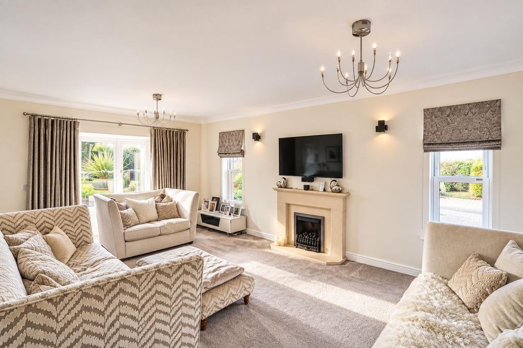 Property photo 2 of 42 Elegant Sunlit Neutral Living Room.Png