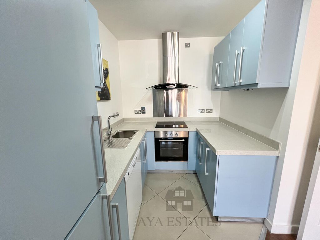 Property photo 3 of 12 Kitchen