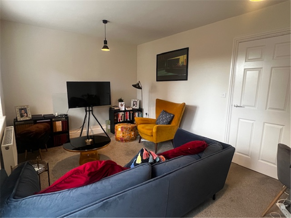 Property photo 3 of 11 Living Area