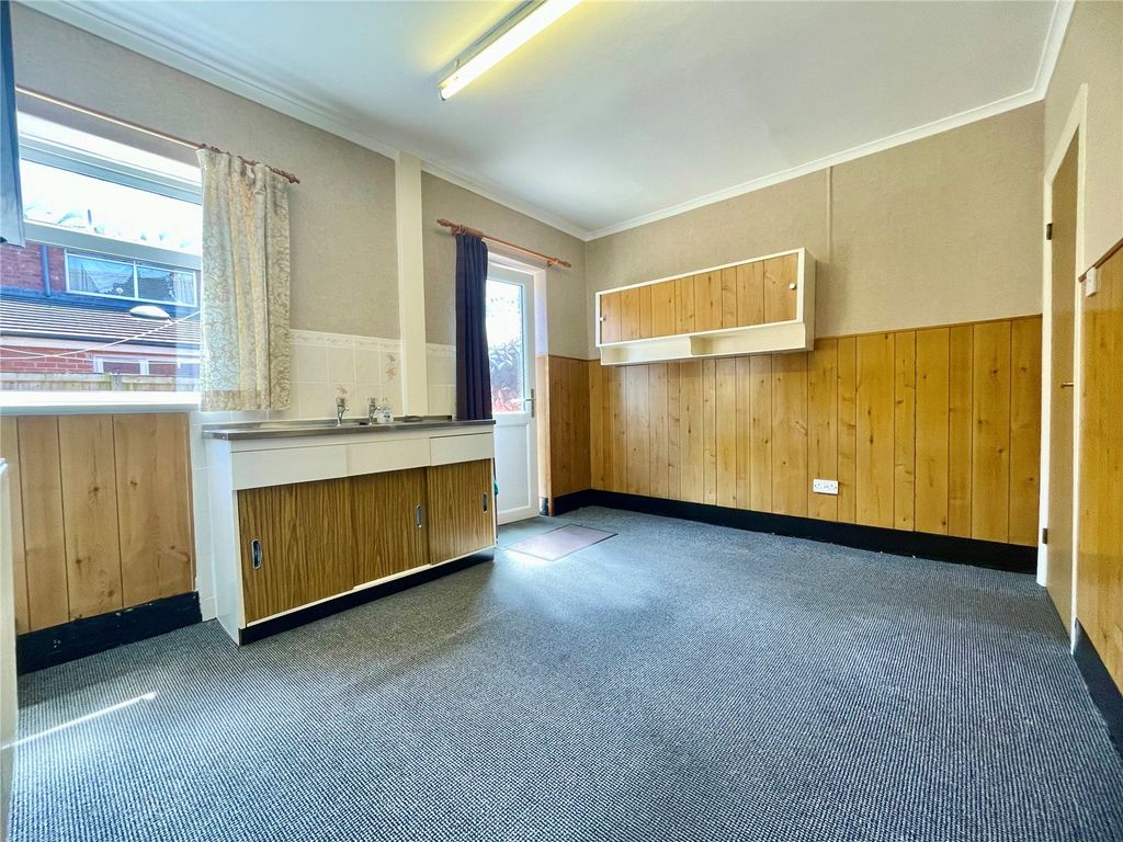 Property photo 3 of 11 Dining Kitchen