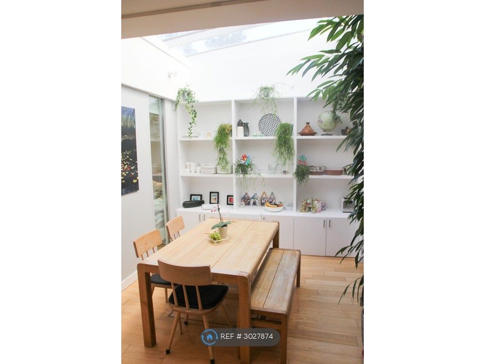 Property photo 3 of 10 Dining Area With Skylight