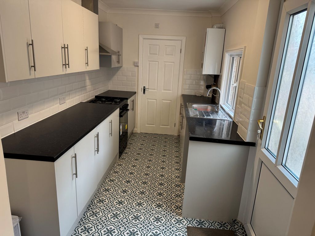 Property photo 1 of 8 Kitchen