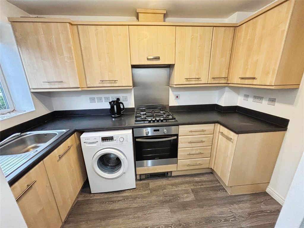 Property photo 2 of 12 Kitchen