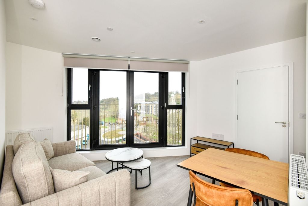 Property photo 1 of 7 Living Area