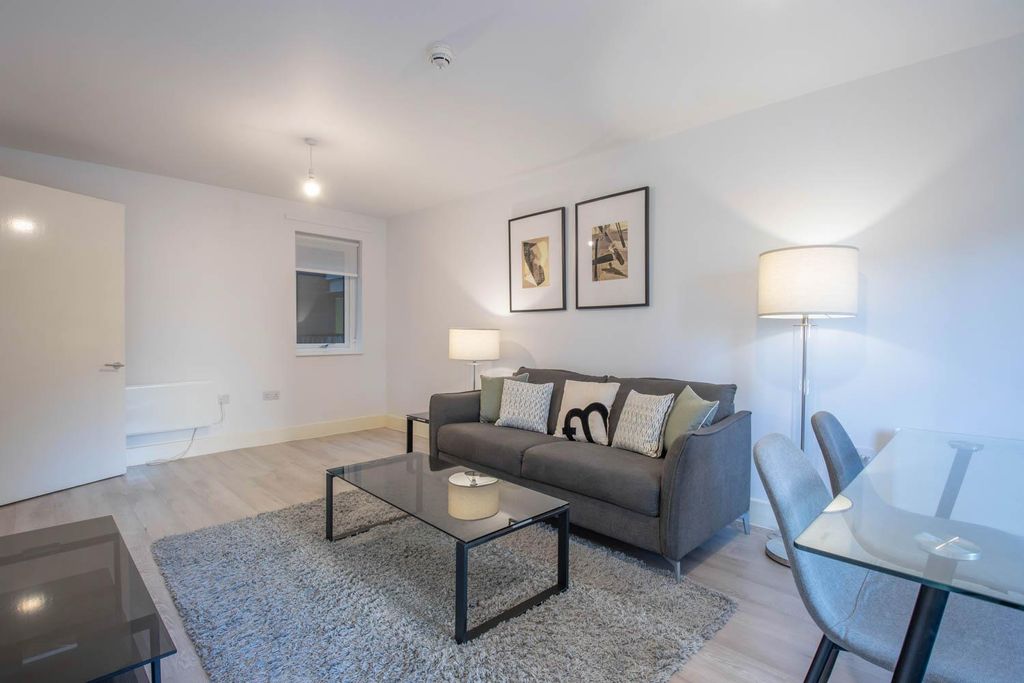 Property photo 2 of 13 Living Area