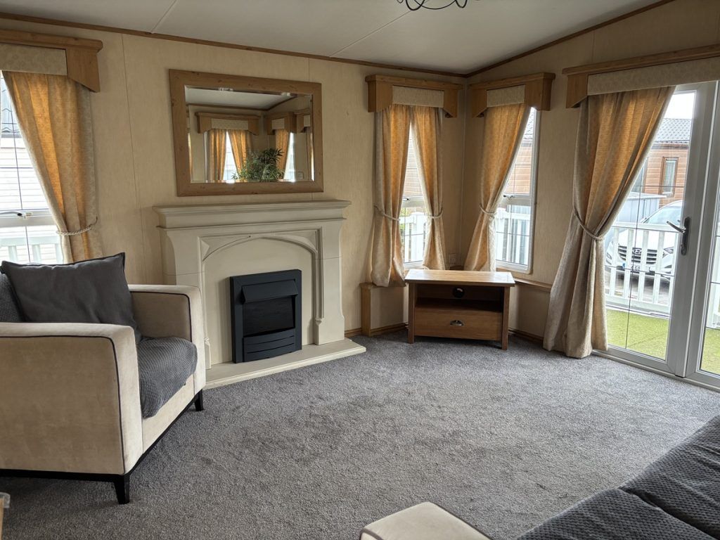 Property photo 3 of 6 Spacious Abi Westwood Lounge With Feature Fireplace And Patio Doors