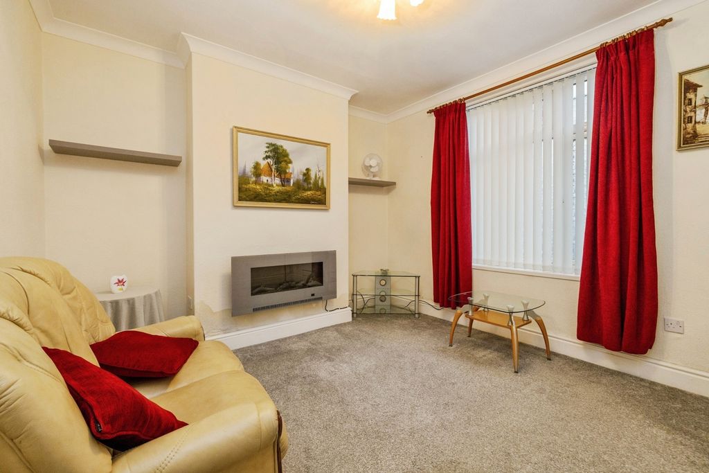 Property photo 3 of 12 Living Room