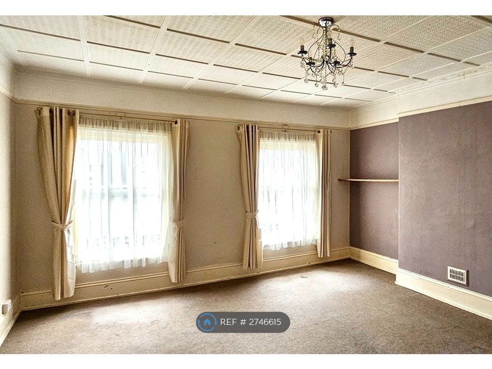 Property photo 3 of 9 Living Room Day