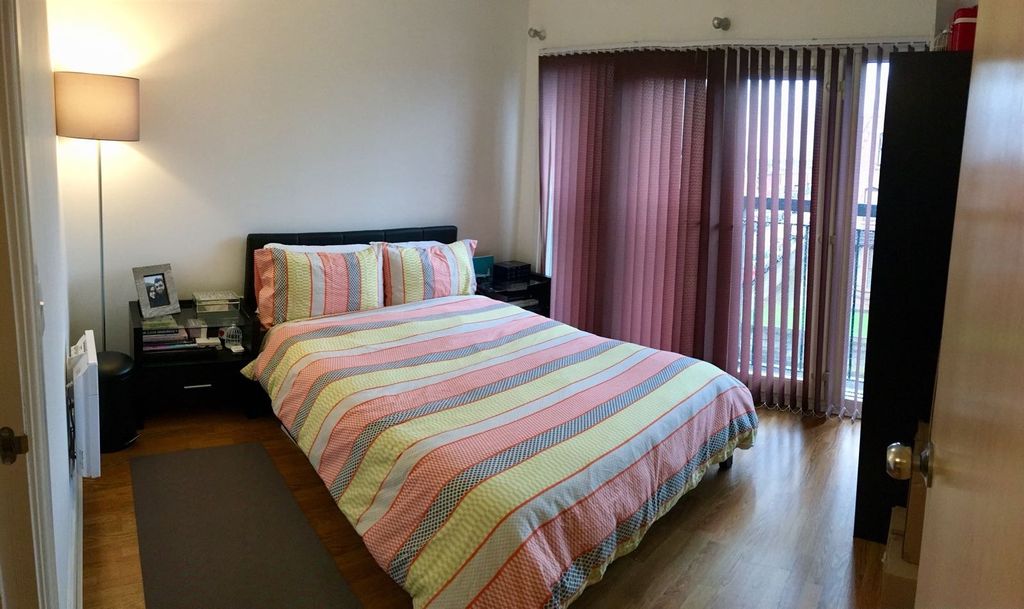 Property photo 1 of 7 A Bright And Well-Kept Master Bedroom Featuring A ...