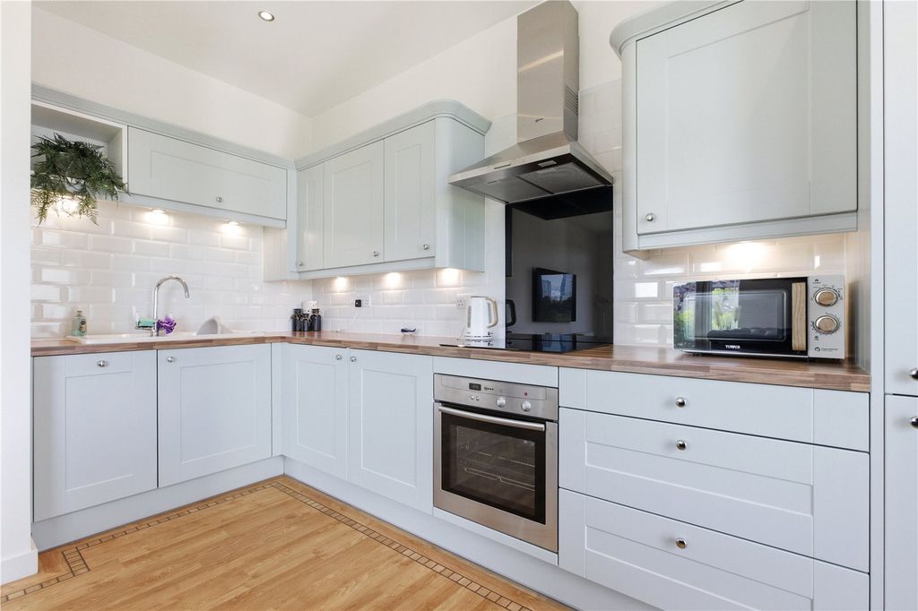 Property photo 3 of 13 Kitchen