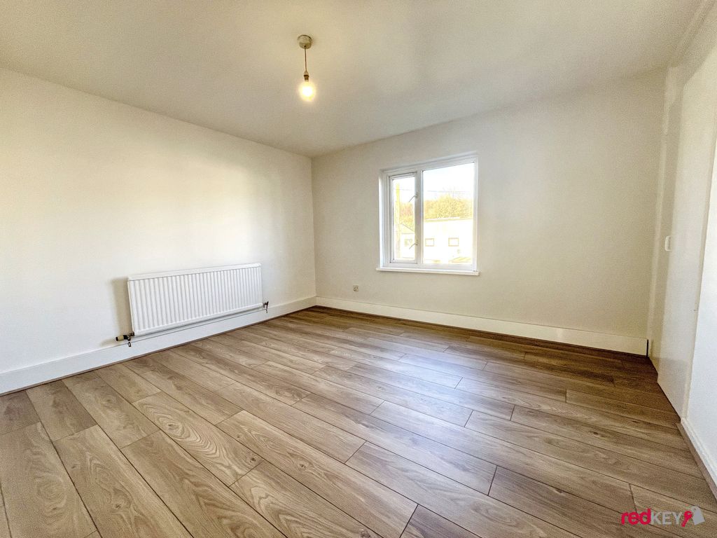 Property photo 3 of 6 Bedroom One