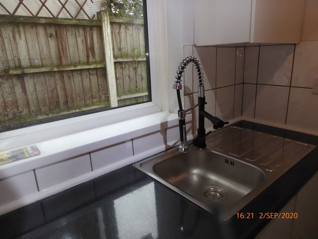 Property photo 2 of 9 Kitchen