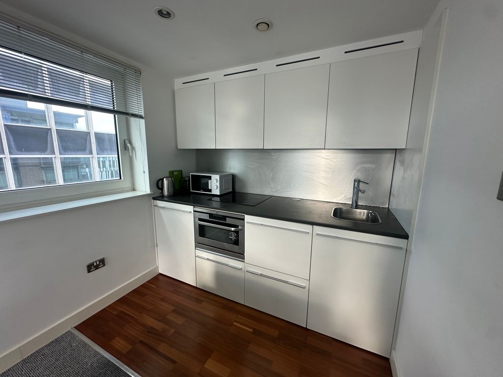 Property photo 3 of 7 Kitchen