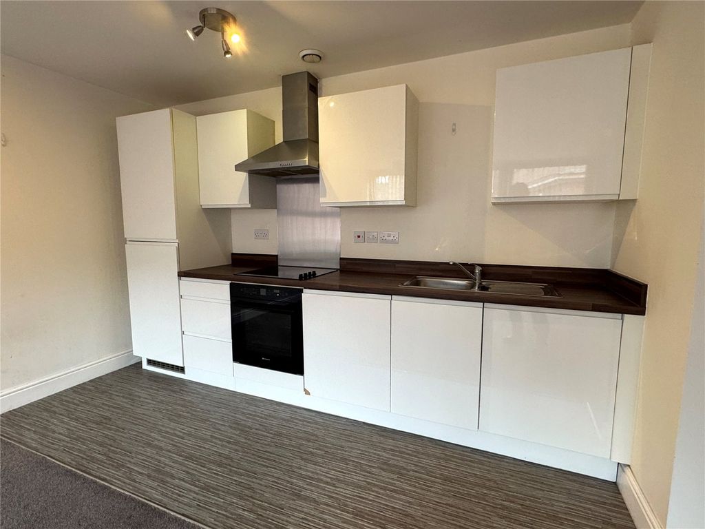 Property photo 3 of 7 Kitchen Area