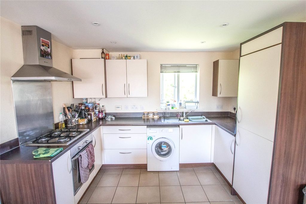 Property photo 3 of 9 Kitchen Area
