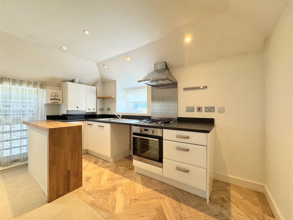 Property photo 2 of 13 Kitchen Area