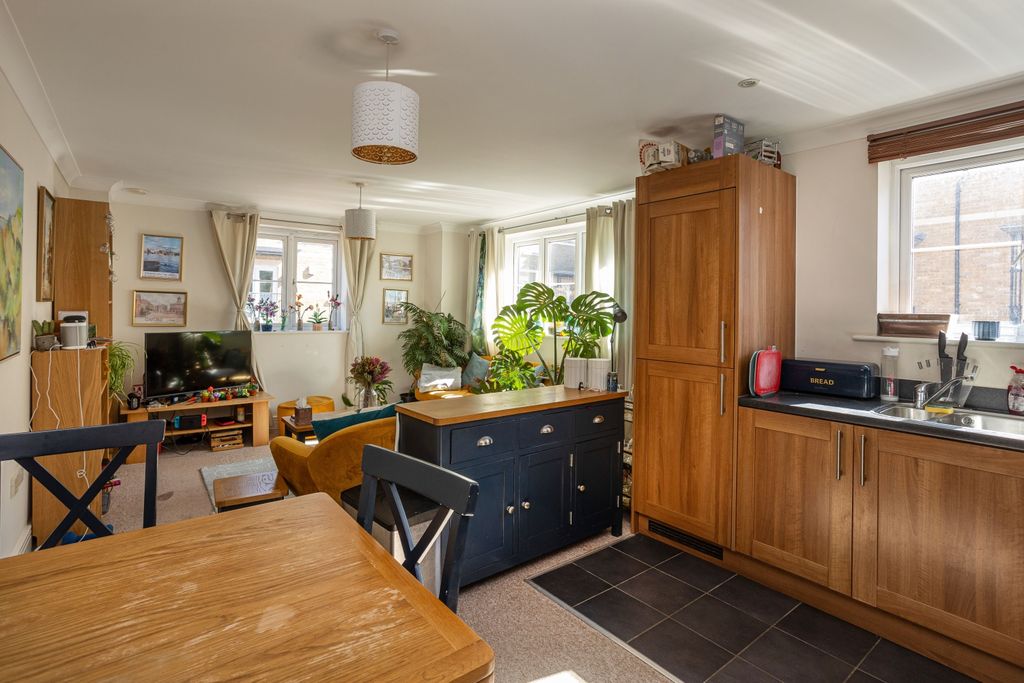 Property photo 2 of 12 Kitchen Living Area