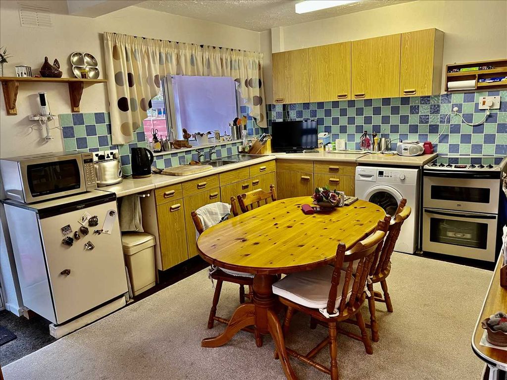 Property photo 3 of 10 Dining Kitchen