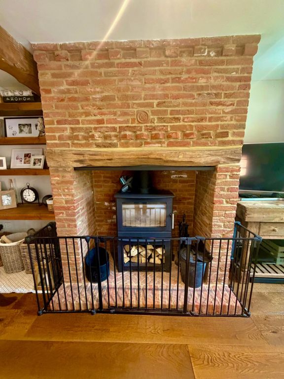 Property photo 3 of 12 Fireplace
