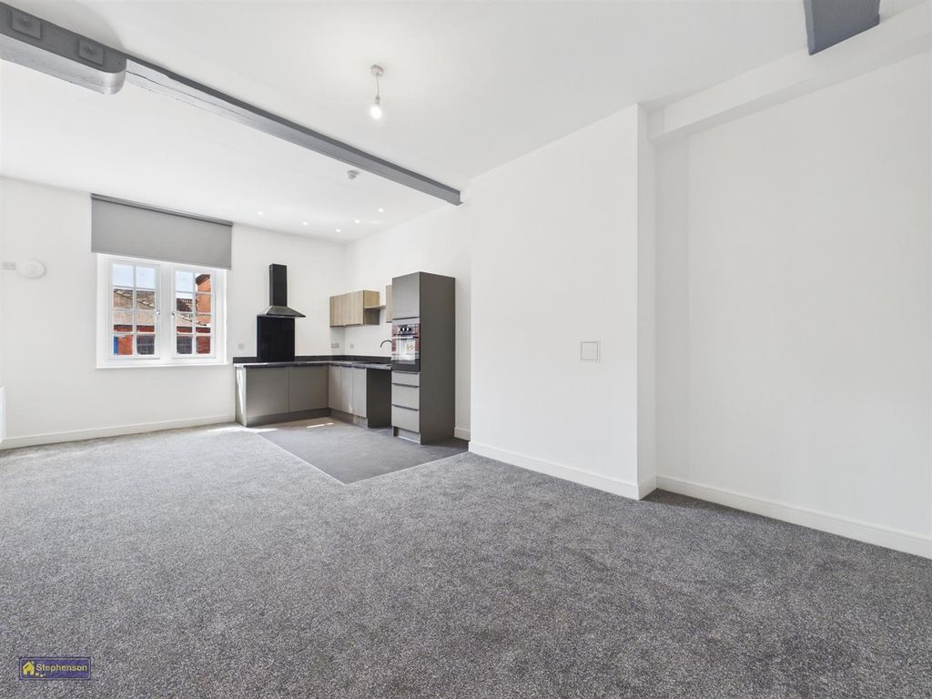 Property photo 1 of 7 Kitchen Living Room