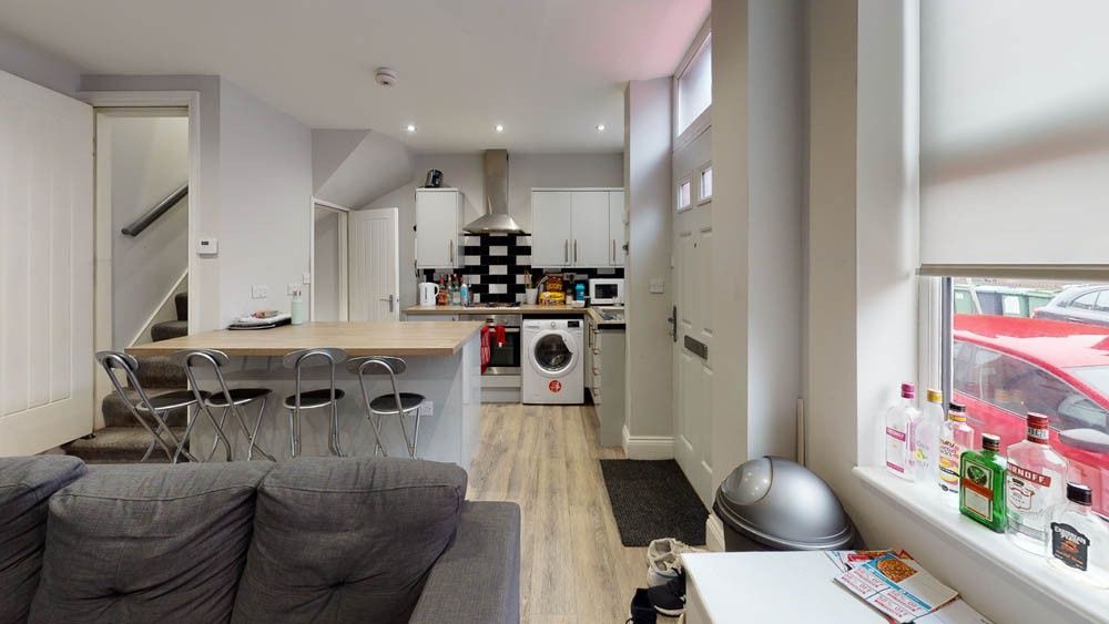 Property photo 3 of 7 Bright Open-Plan Living Area With A Comfortable So...