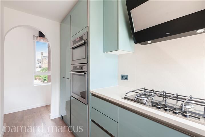 Property photo 2 of 8 Kitchen