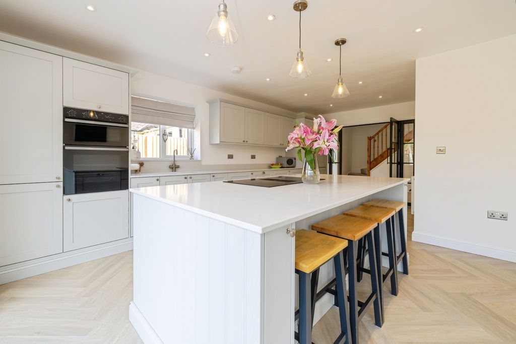 Property photo 2 of 25 Kitchen/Dining/Family Room