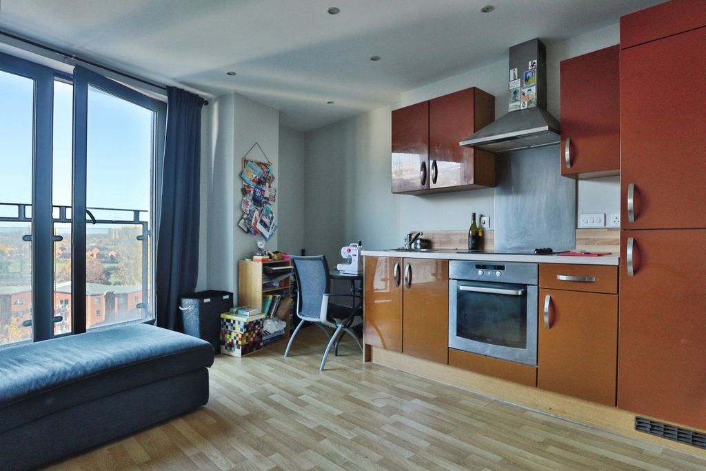 Property photo 1 of 12 Living Area