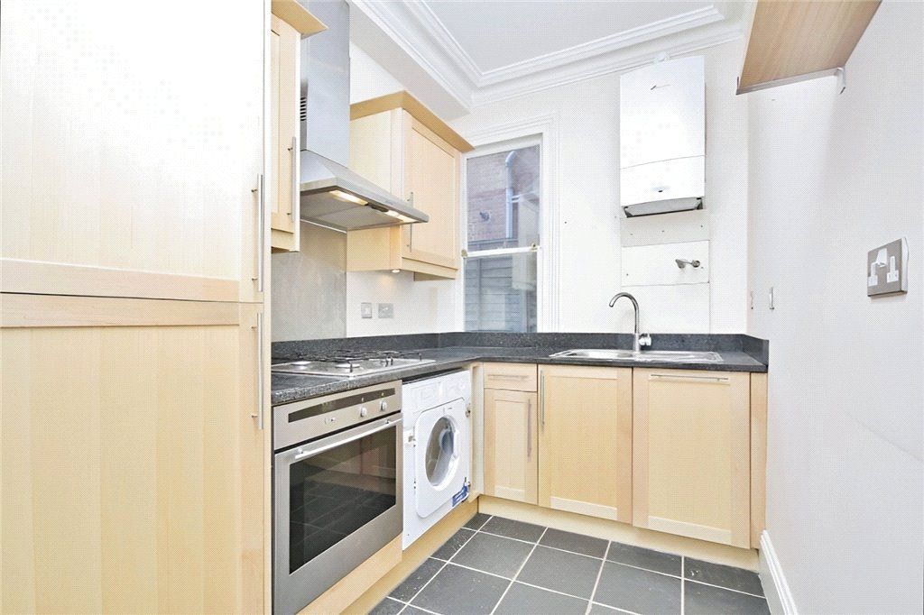 Property photo 3 of 8 Kitchen
