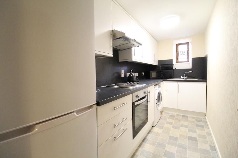Property photo 3 of 7 Kitchen